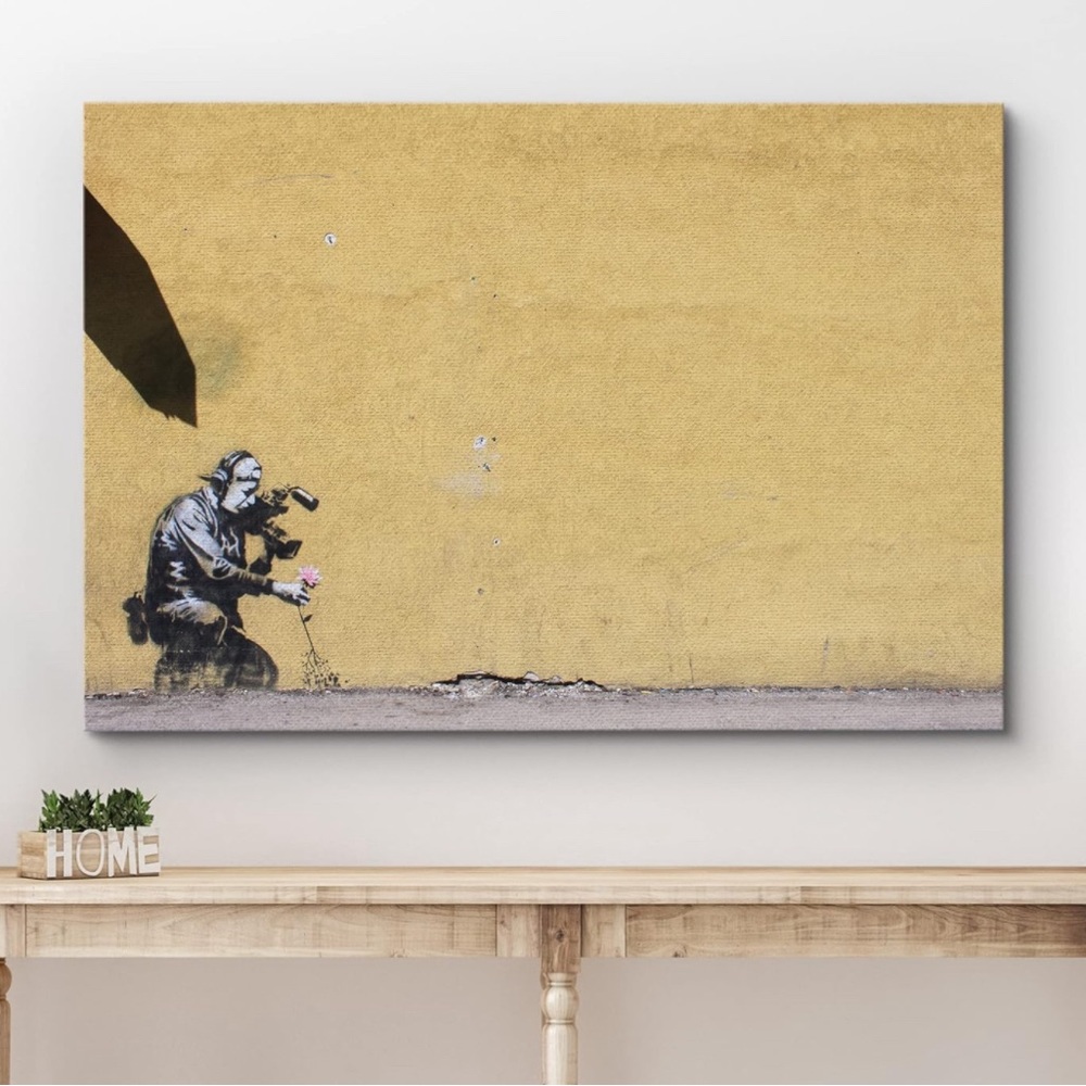 Camera Man With Flowers Canvas Art by Banksy